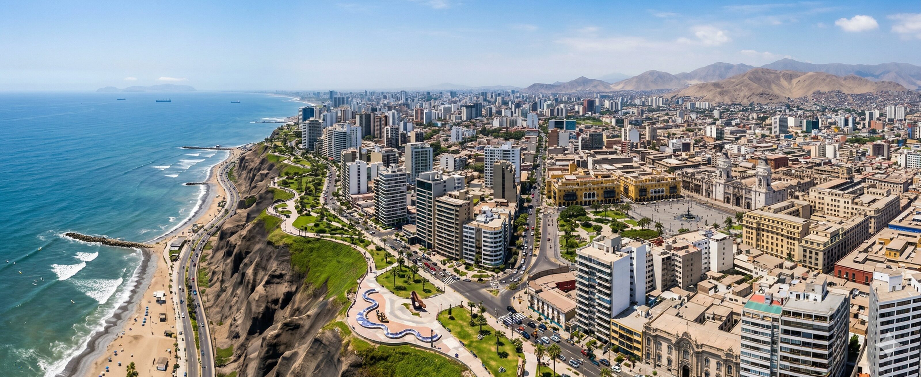 Sweeping panoramic aerial view of Lima, Peru, featuring the high Costa Verde cliffs overlooking the Pacific Ocean and the coastal district of Miraflores with modern high-rises.