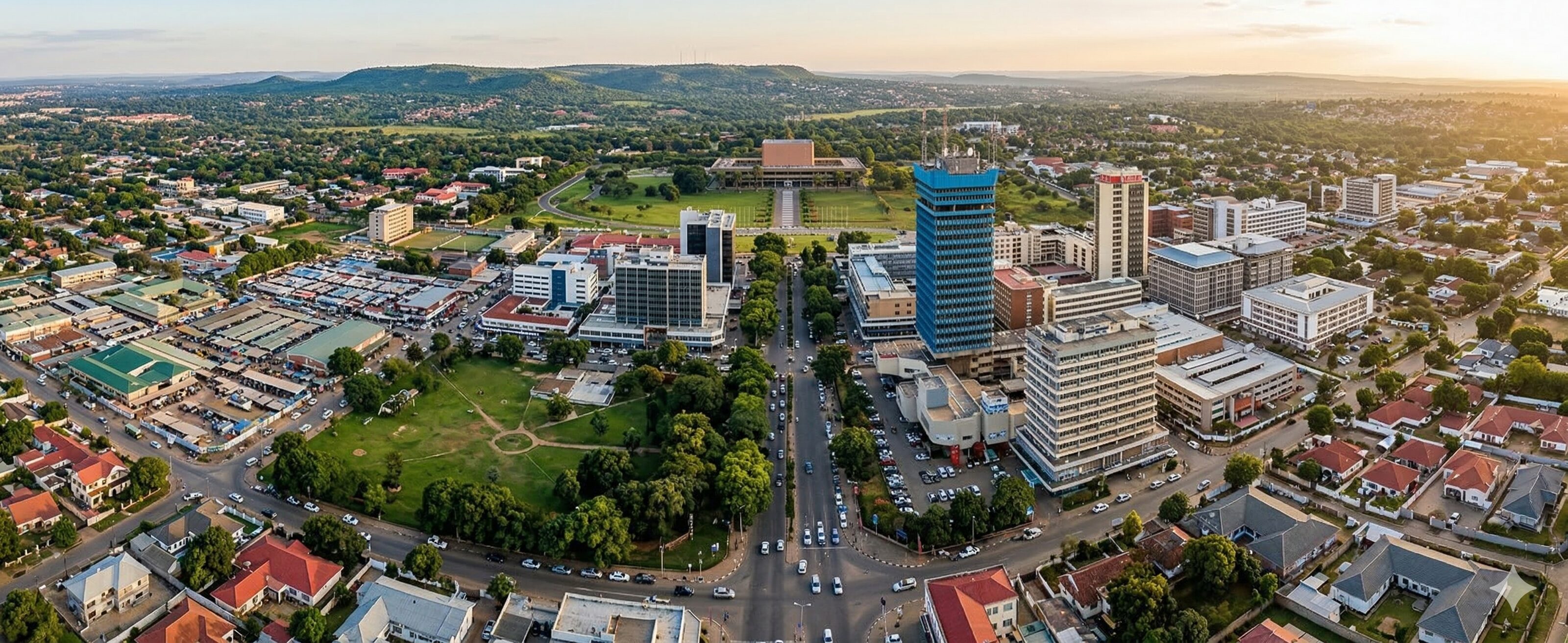 Aerial view of Lusaka's business district, medical pedicure course background.